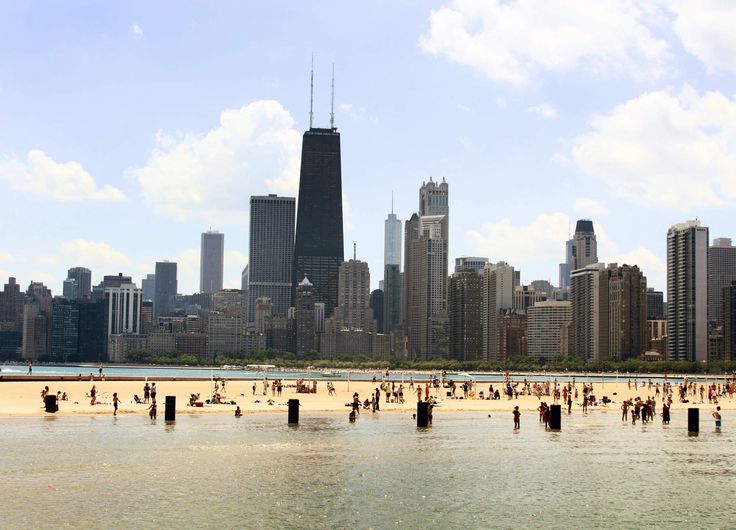 image of ocean with city in the background