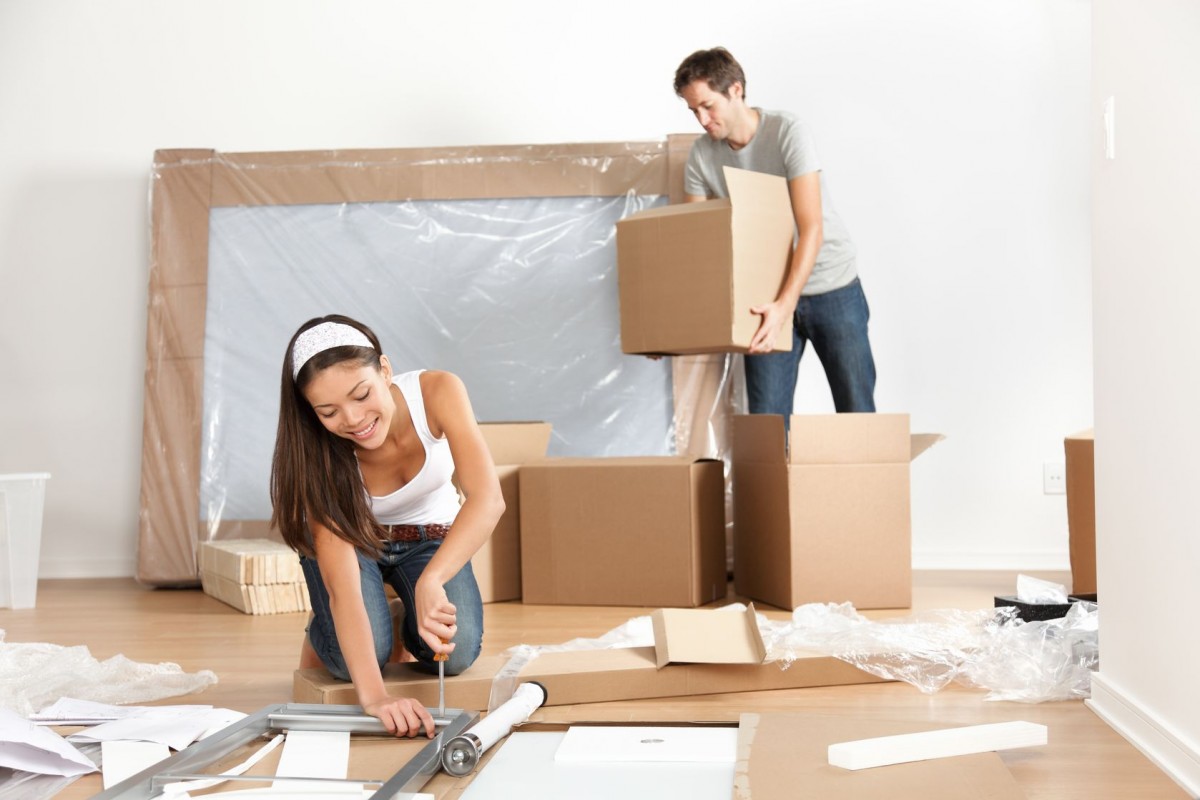 husband and wife using safe moving practices