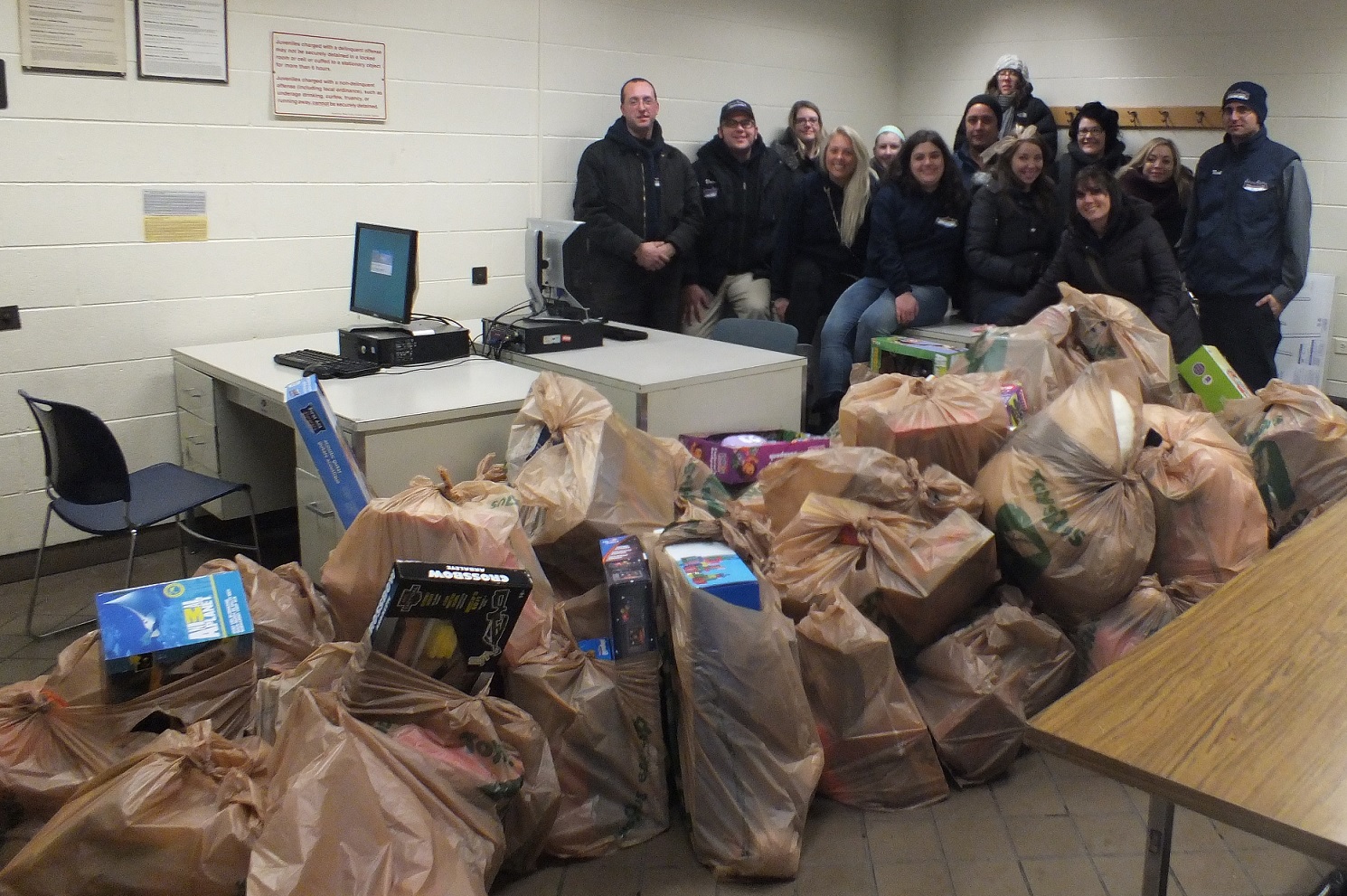 New City Moving Donates 705 toys to the 14th District Police Station for Christmas 2013