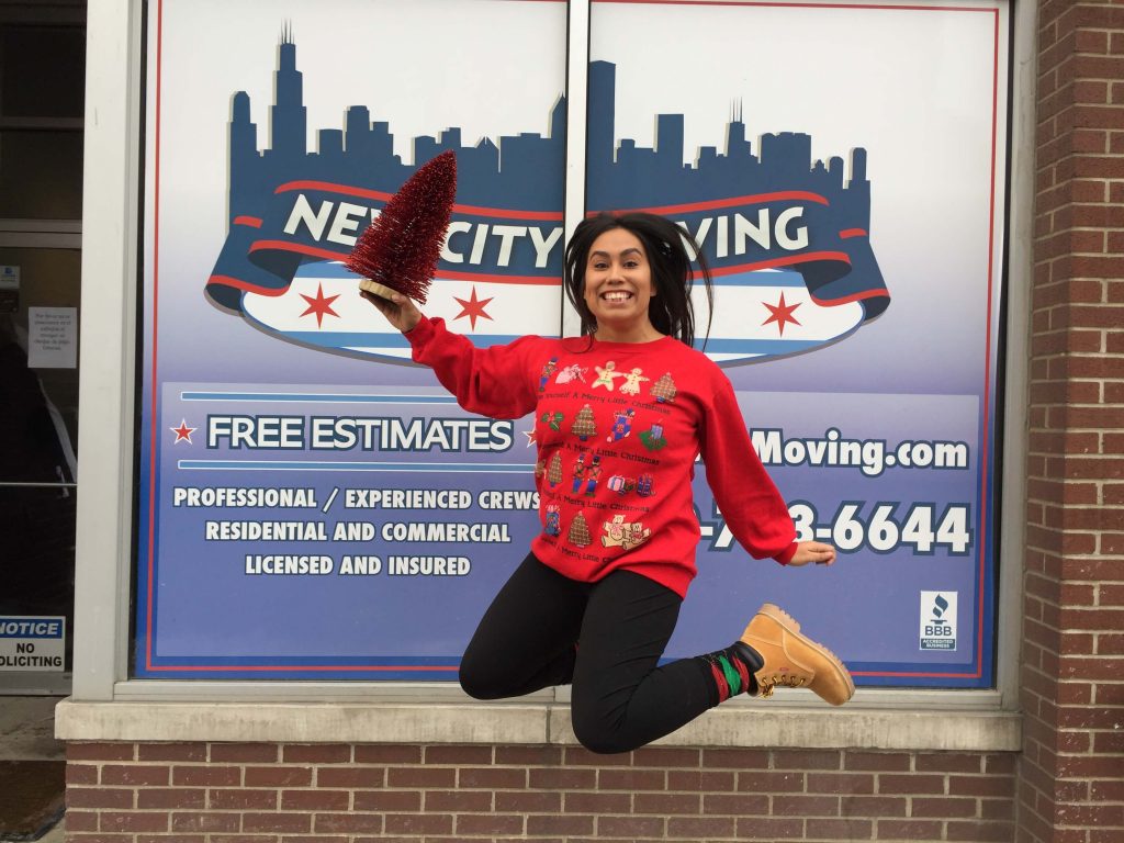 new city moving employee jumping in the air